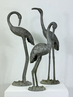 Collection of Weathered Cast Aluminium Cranes