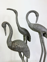 Collection of Weathered Cast Aluminium Cranes