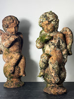 Pair of Vintage Weathered Terracotta Cherub Statues