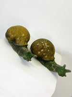 Pair of Weathered Stone Garden Snail Statues