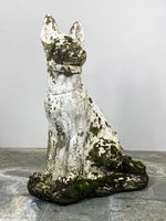 Statue of a Weathered Dog