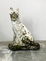 Statue of a Weathered Dog
