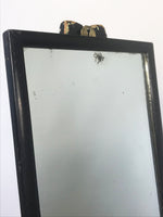 Decorative Antiques - Ebonised outfitters mirror. Patches of ageing to mirror plate. Original brass fixture hook.  Circa: 1920's
