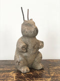 Decorative Antiques - Concrete rabbit. Over time this rabbit has sustained some damage exposing metal rods used in the construction of the ears. Circa: 1940's