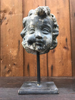 Stone Head on Stand